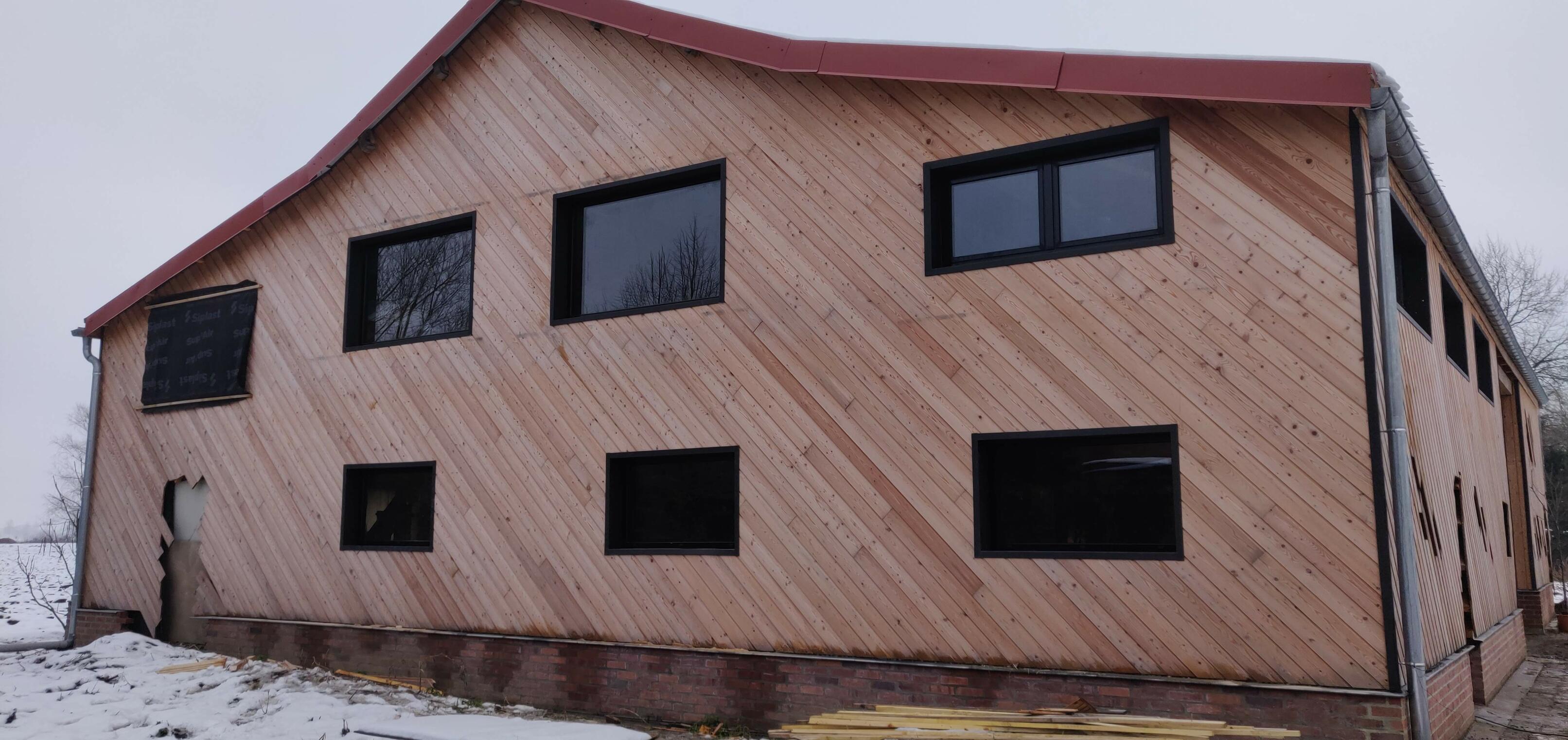 Travaux de bardage bois avec isolation extérieure à Beuvrages