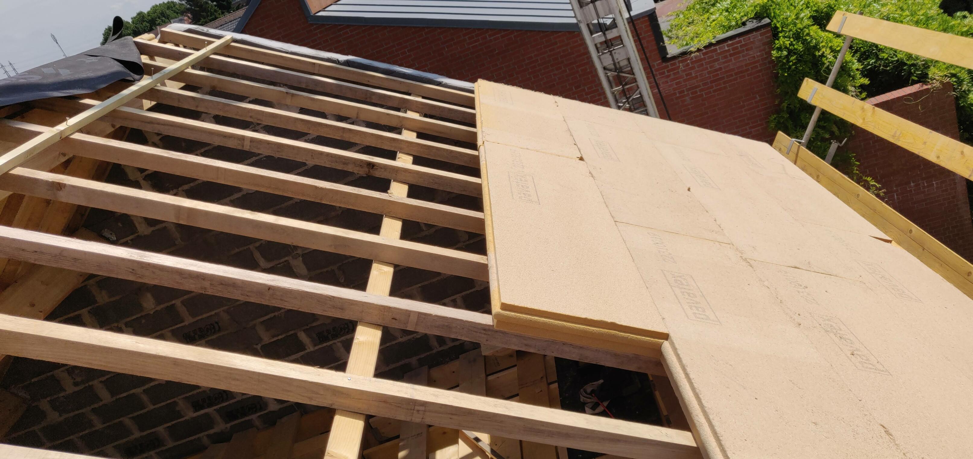 Isolation de toiture par sarking pour renforcer les performances thermiques à Baisieux