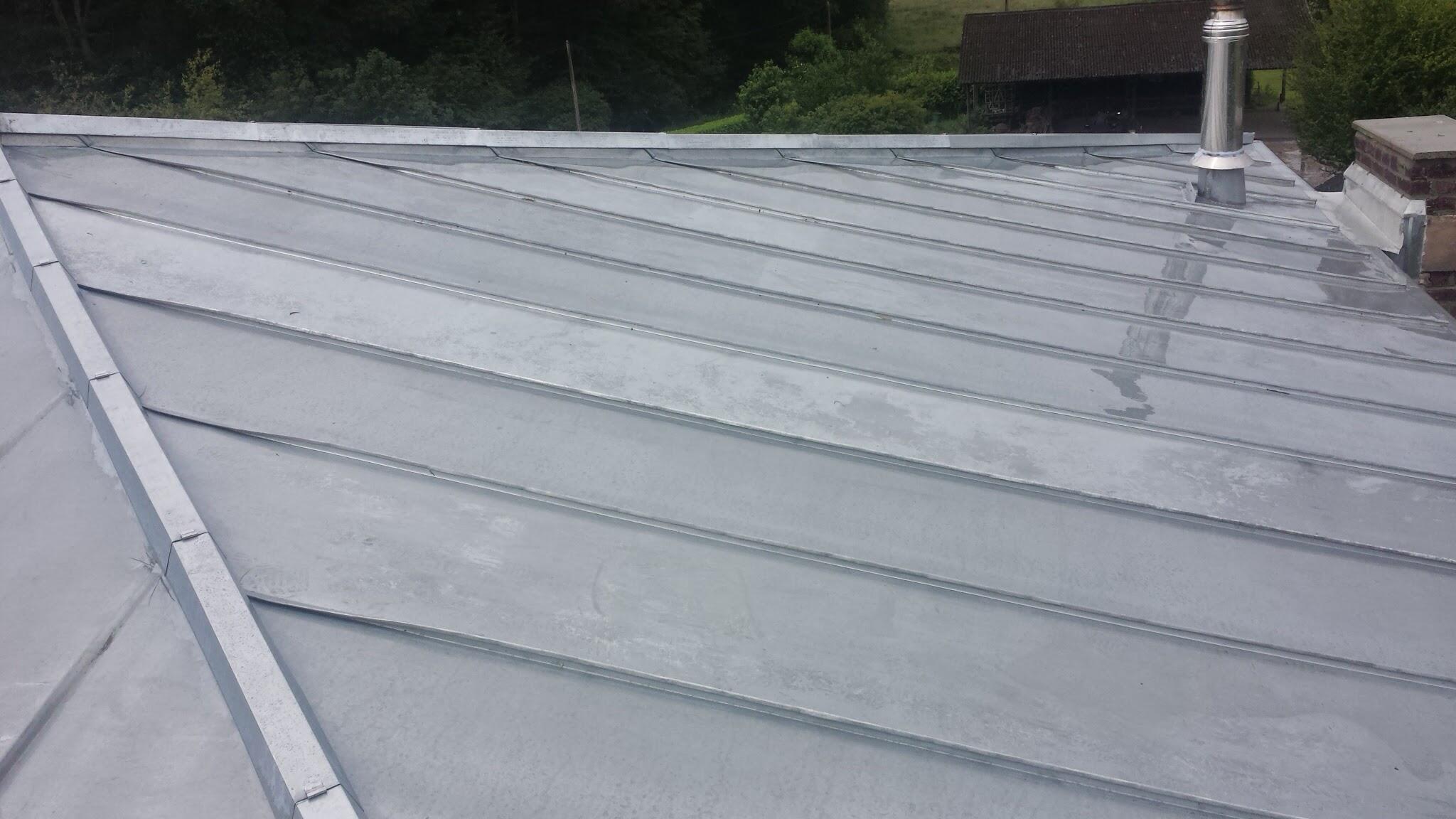 Réalisation d’une toiture en zinc offrant résistance et esthétisme à Mons-en-Barœul