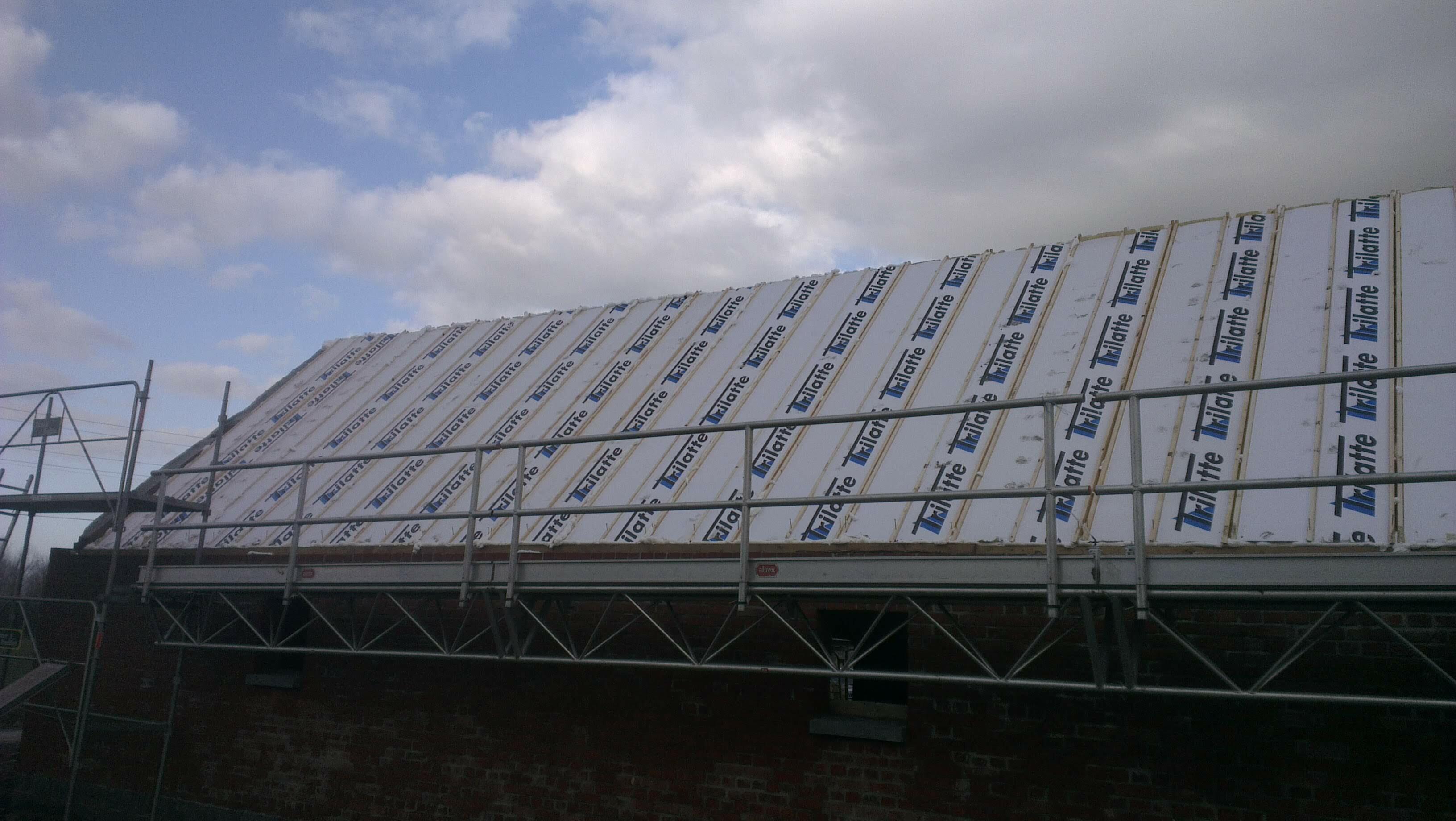 Isolation par caisson chevronné réalisée lors de travaux de toiture à Genech