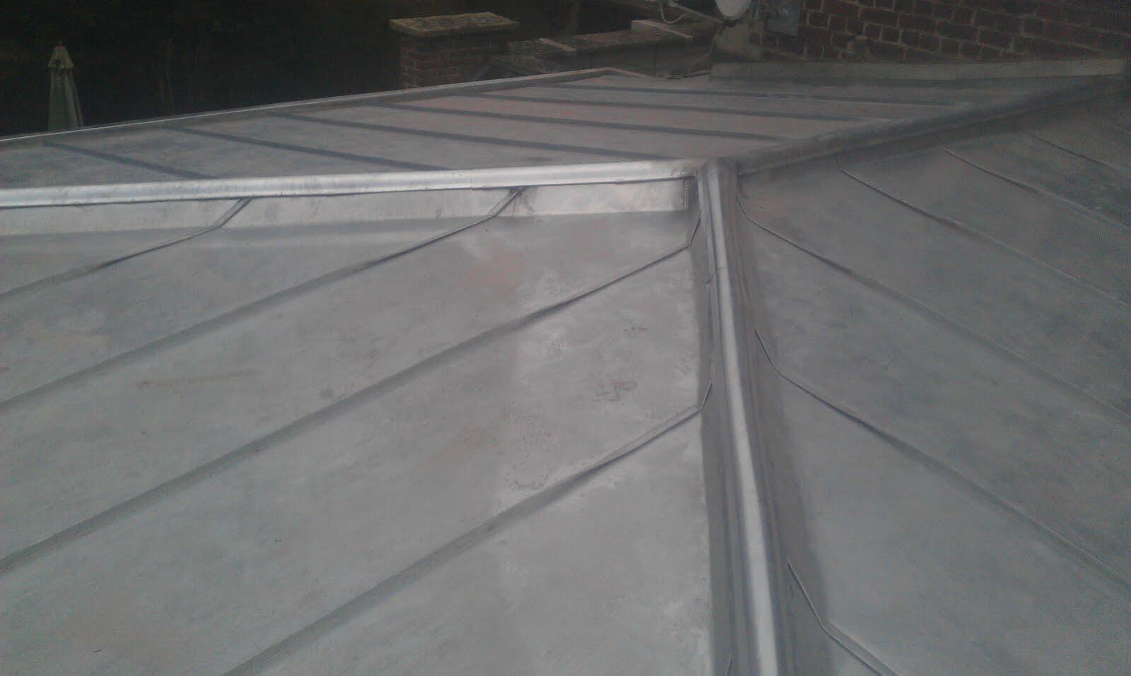 Toitures en zinc réalisées pour assurer une protection performante sur les bâtiments du Valenciennois