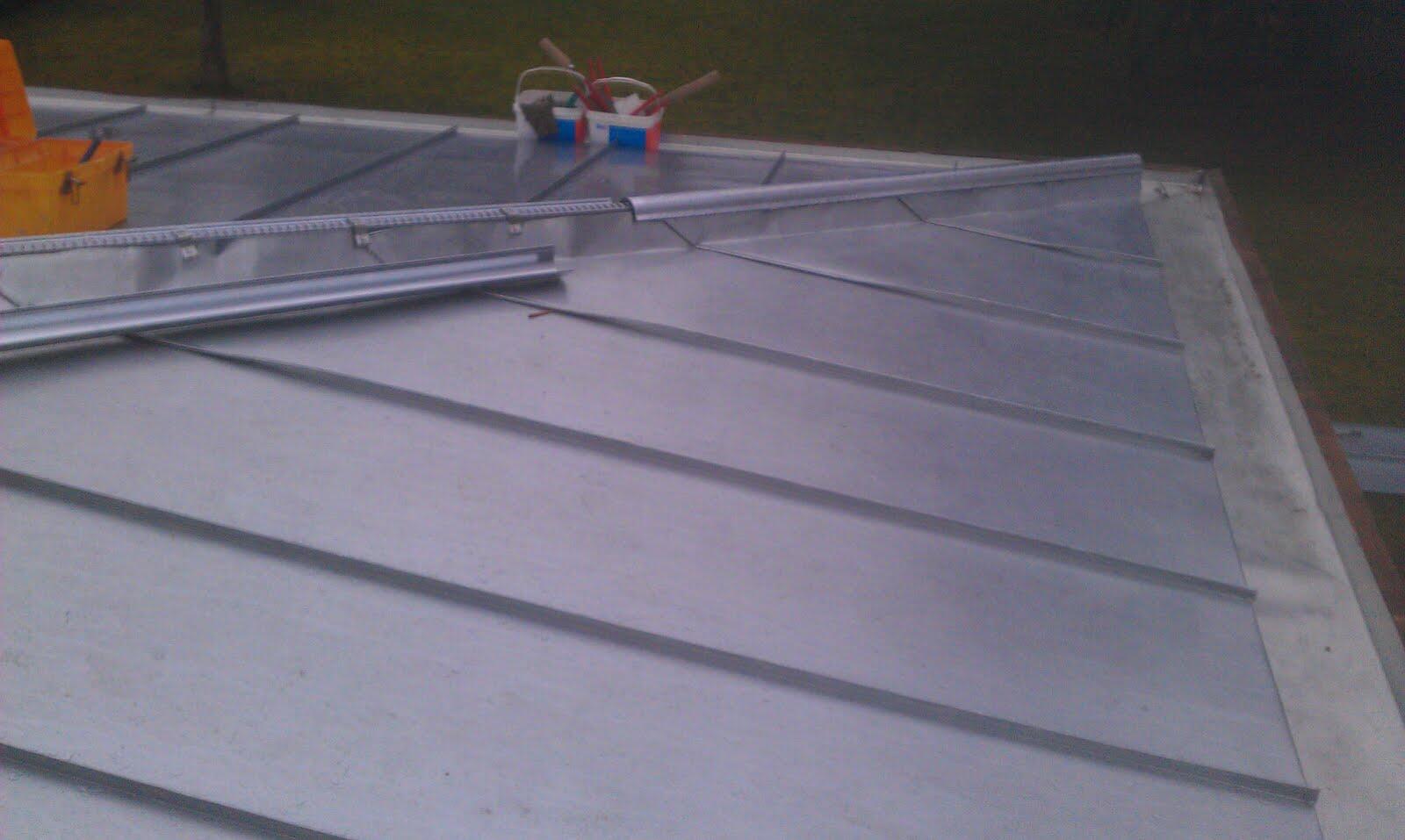 Travaux de zinguerie traditionnelle pour assurer l’étanchéité de la toiture à Genech